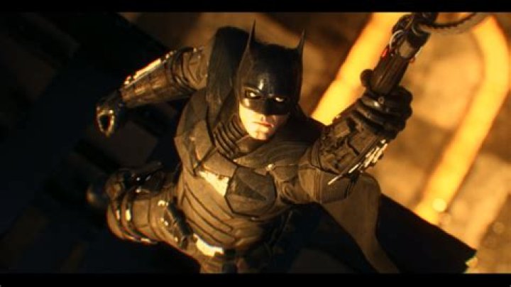 How do I glide in "Batman: Arkham City" during the "Demon Trials"?