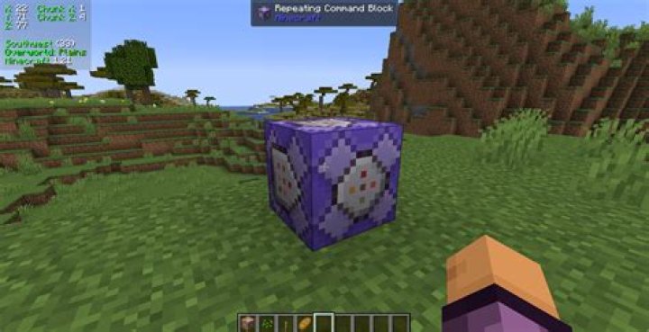 How do I place redstone with a command block?