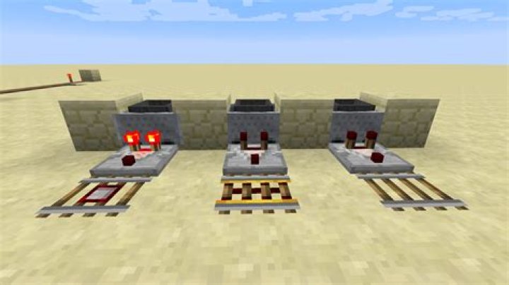 moving minecart once hopper has items, and then becomes empty