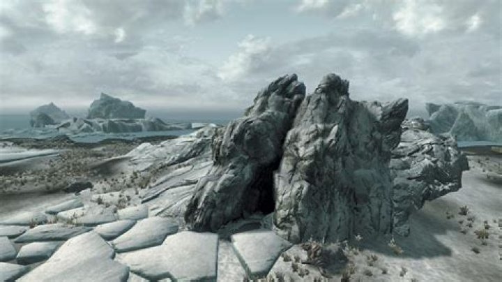 What is the name of the glacial cave containing two frost atronachs, and how do we teleport to that location?